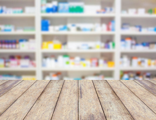 drug store or pharmacy.  shelf of drugs in drug store.  drug store counter.